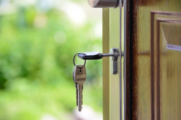 Keys in the door to a house